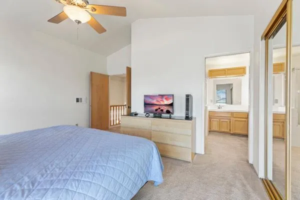 a bathroom with a sink a mirror and a bathtub