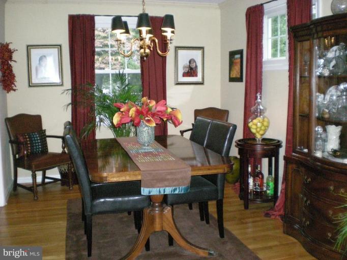 1906 Frederick Road Catonsville, MD 21228 - Photo 4 of 18 Formal dining area with exposed H/W fls.