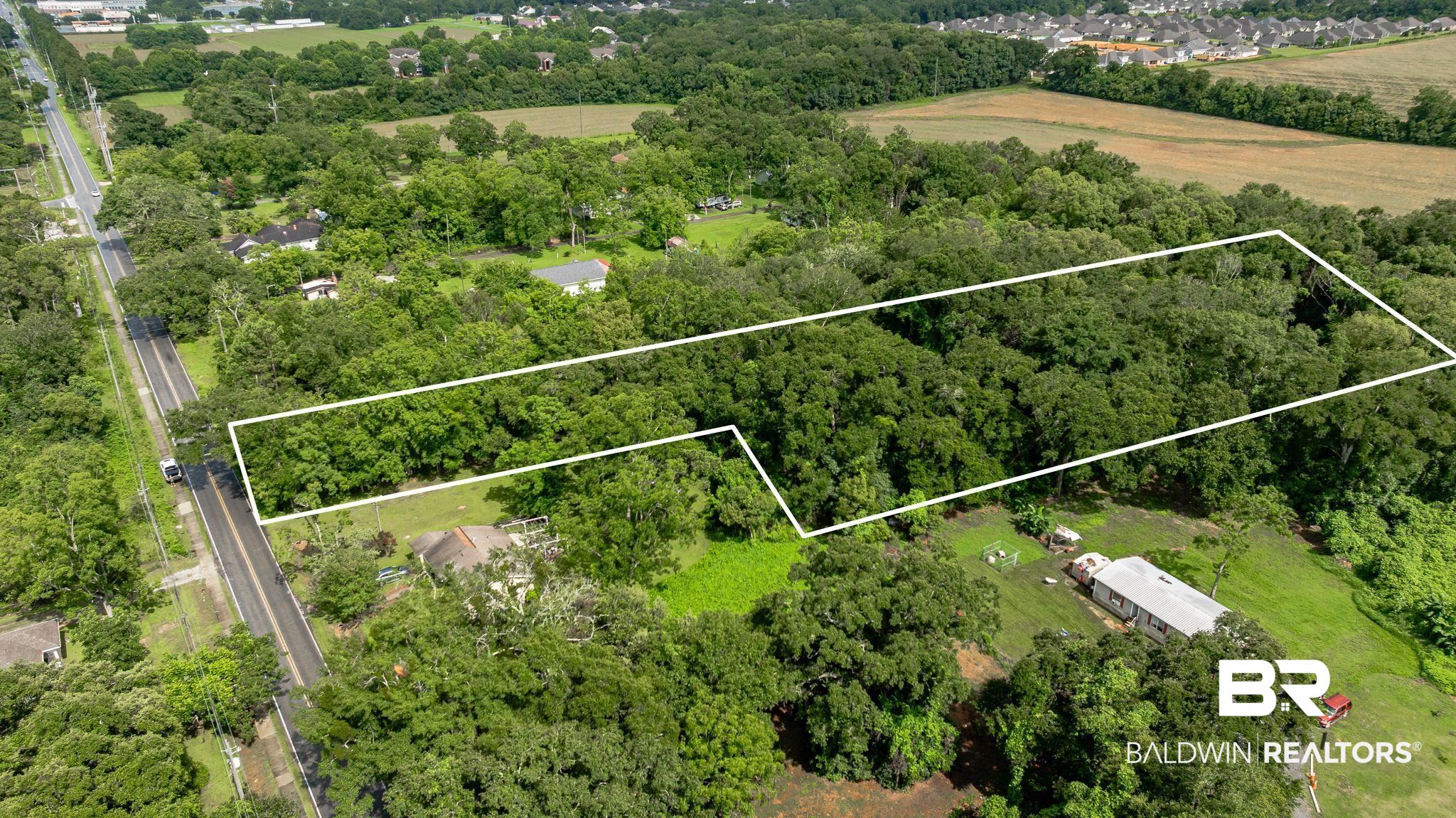7360 Twin Beech Road Fairhope, AL 36532 - Photo 1 of 16 Overview of rural landscape featuring property parcel outlined