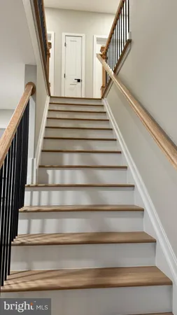 a view of a hallway with a window