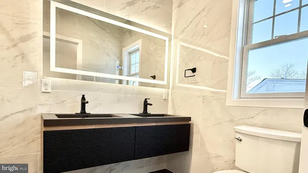 a bathroom with a sink and a toilet