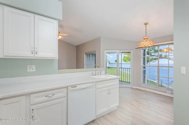 a room with sink and window
