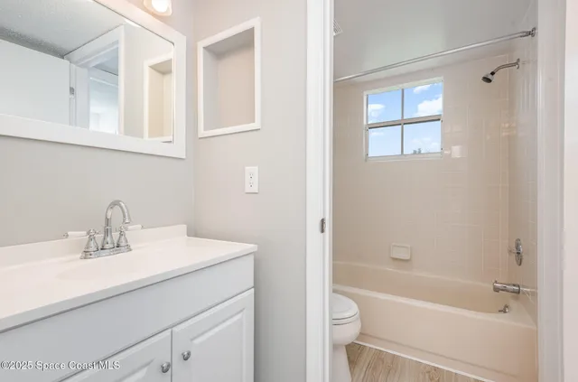 a view of balcony with a small yard