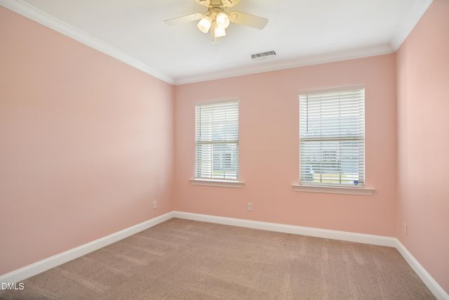 a bathroom with a sink toilet vanity and shower