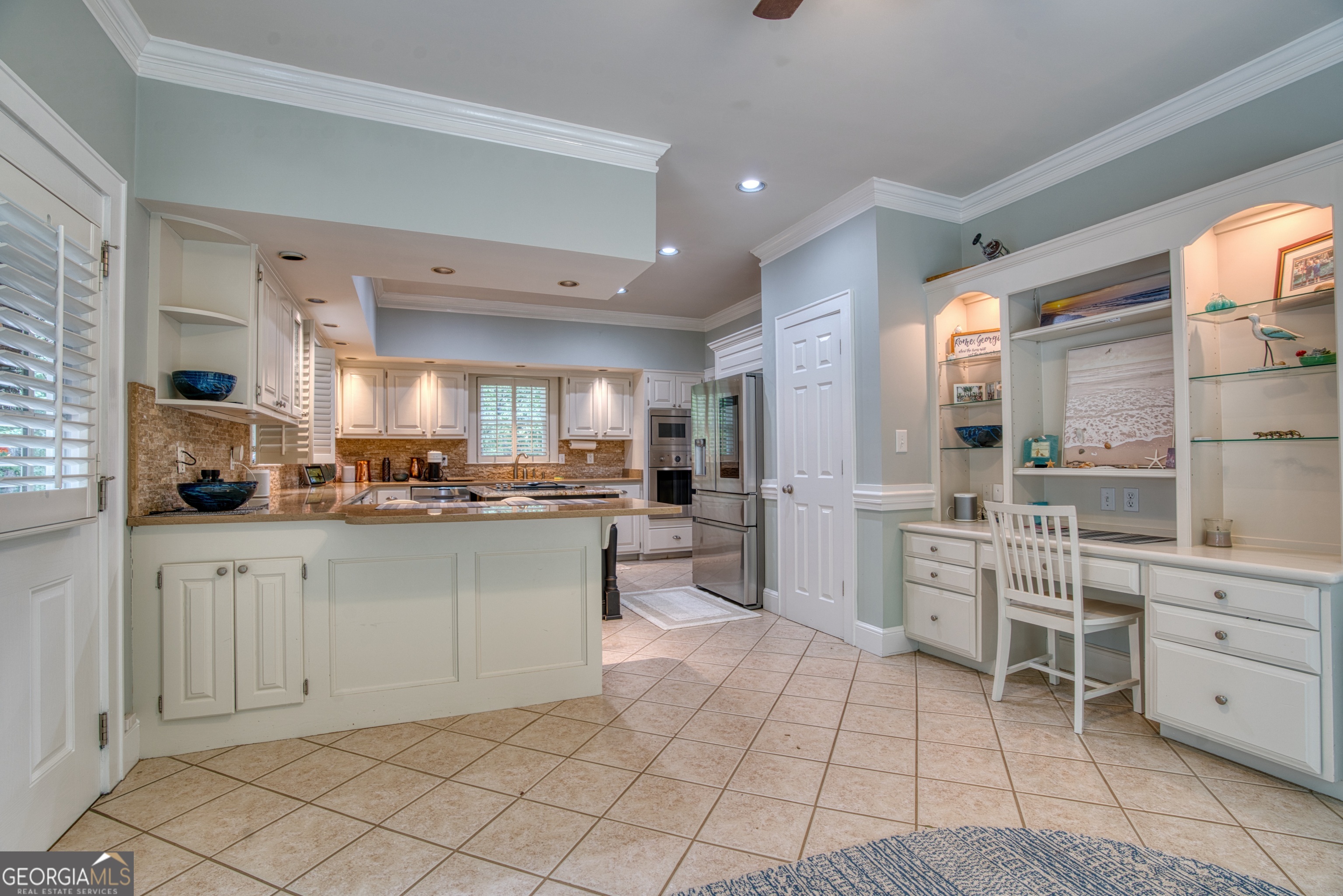 4 Rivermont Drive Southwest Rome, GA 30165 - Photo 16 of 55 a kitchen with white cabinets and appliances
