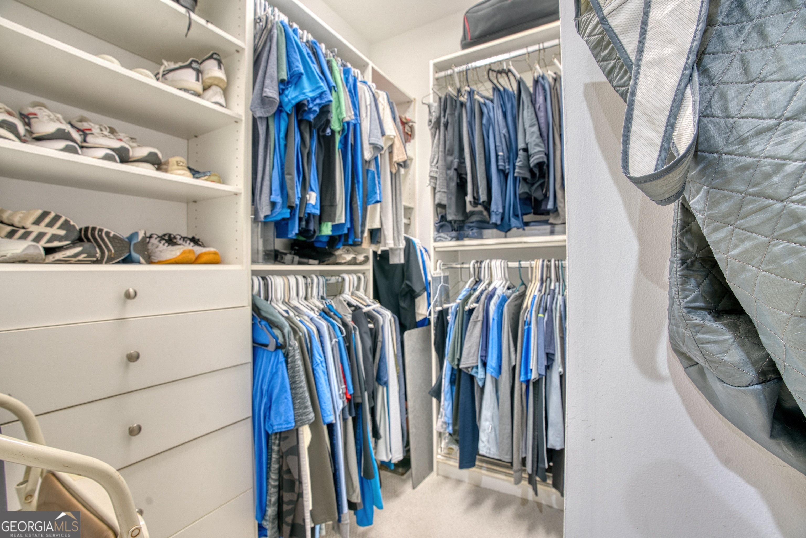 4 Rivermont Drive Southwest Rome, GA 30165 - Photo 28 of 55 a view of walk in closet with clothes and shoes
