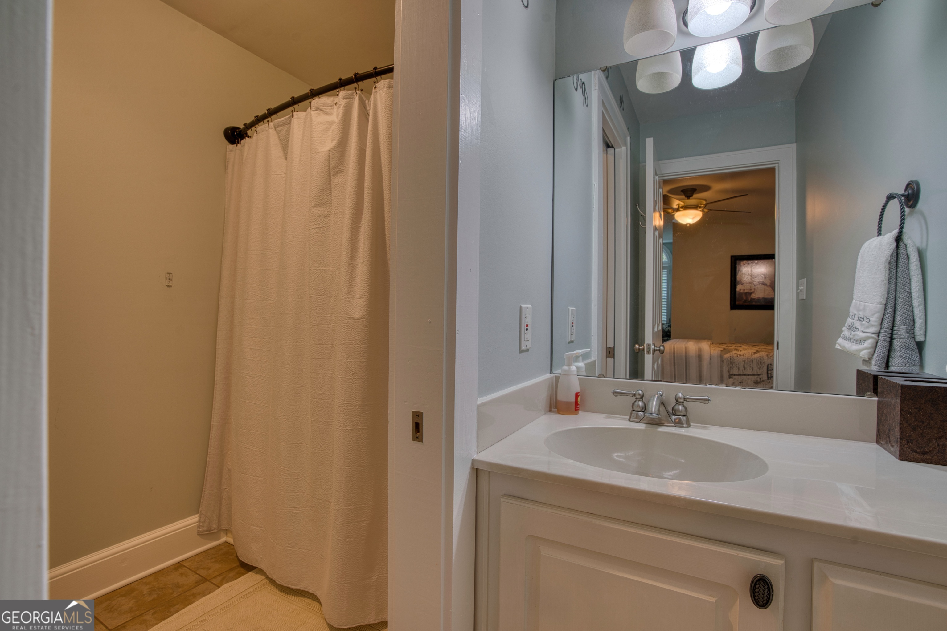 4 Rivermont Drive Southwest Rome, GA 30165 - Photo 34 of 55 a bathroom with a sink and a mirror