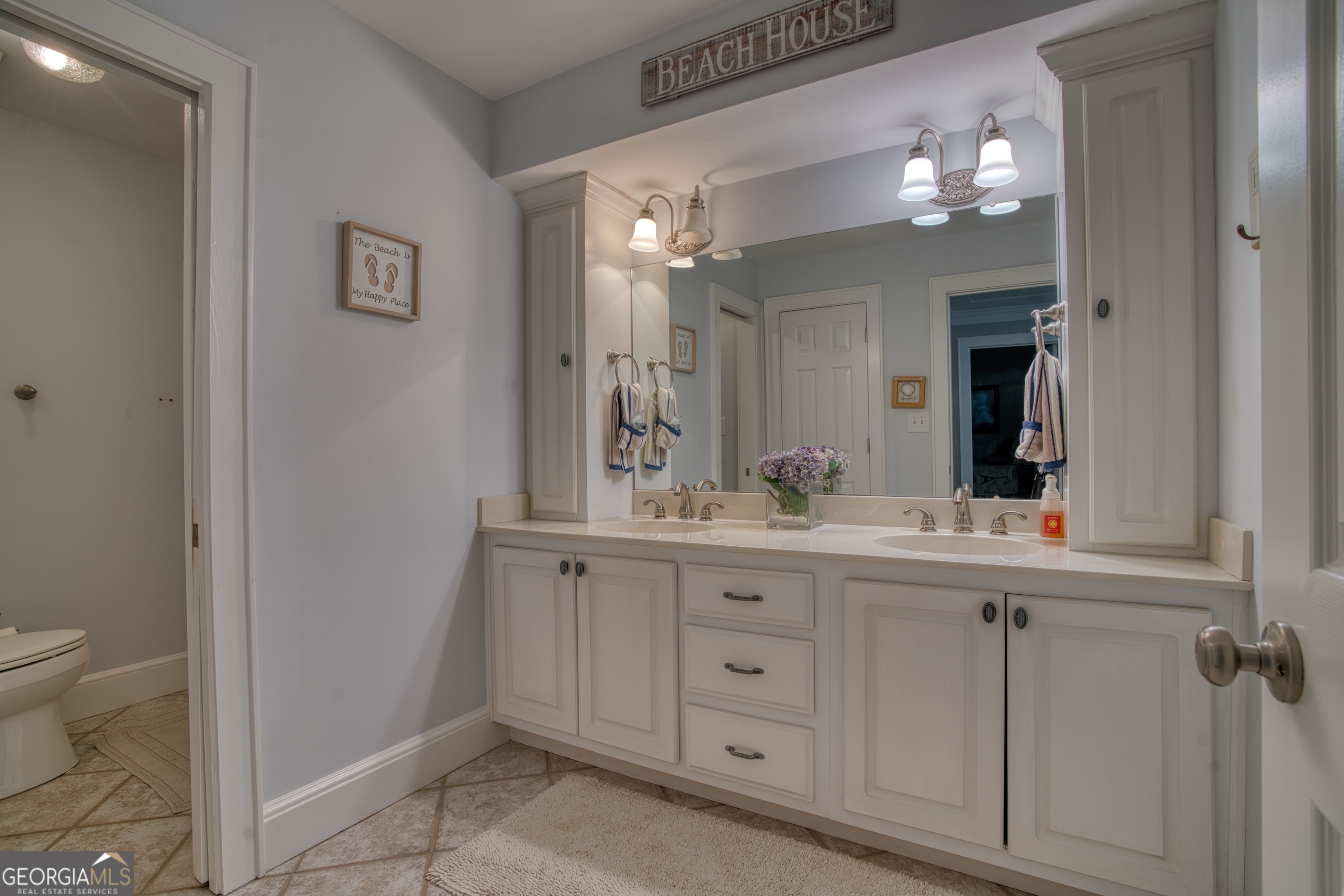 4 Rivermont Drive Southwest Rome, GA 30165 - Photo 35 of 55 a bathroom with a toilet sink and mirror