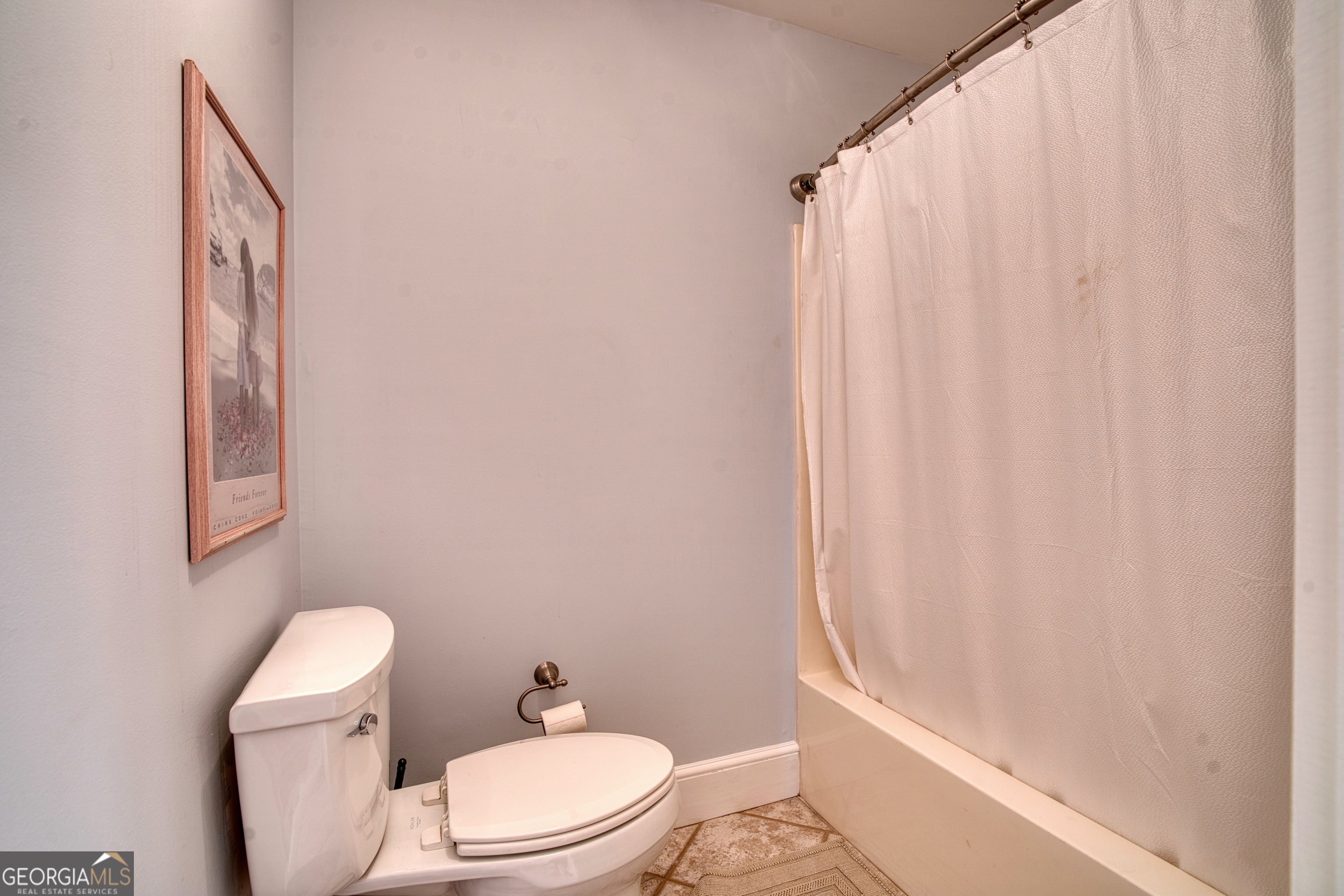 4 Rivermont Drive Southwest Rome, GA 30165 - Photo 39 of 55 a white toilet sitting next to a shower