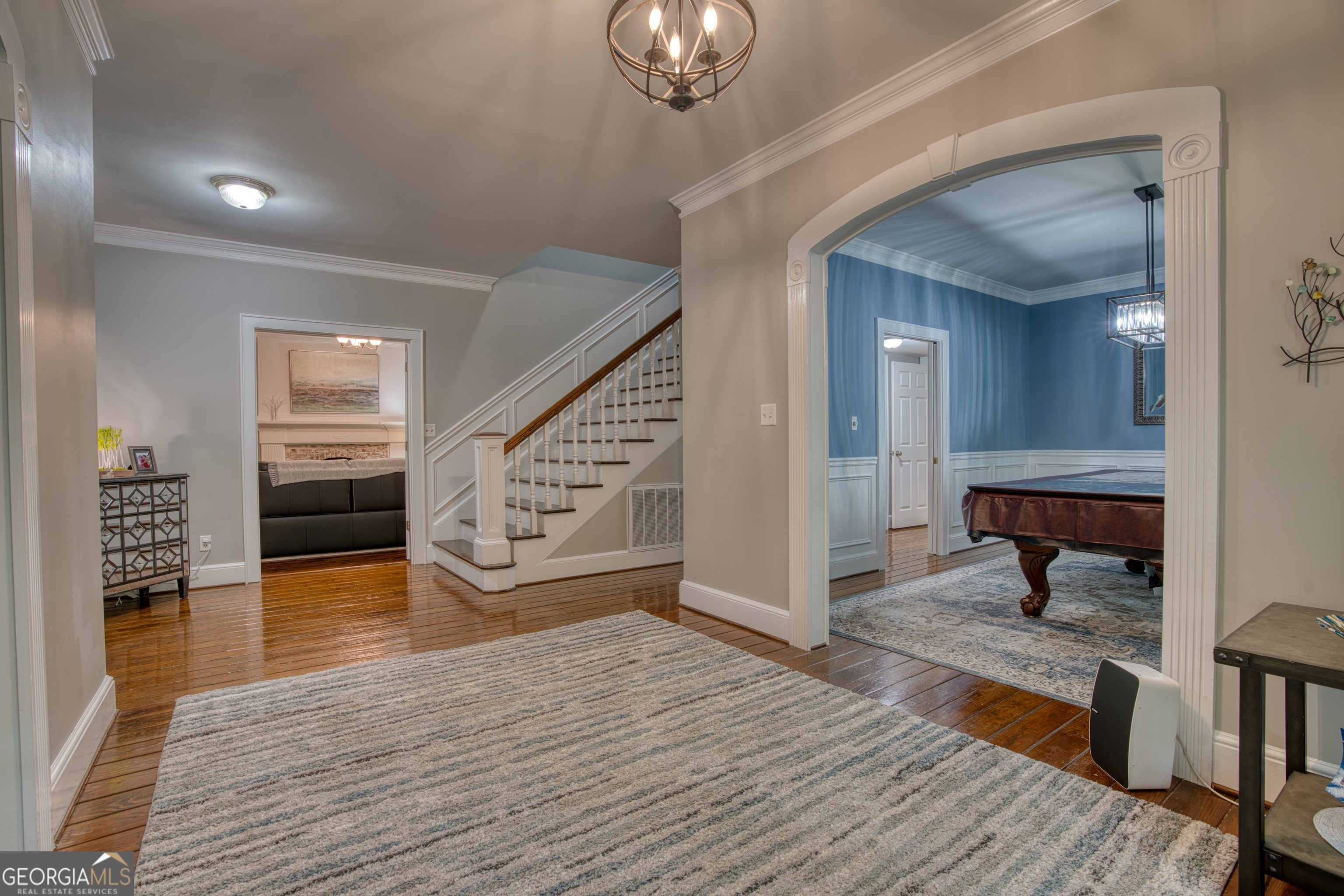 4 Rivermont Drive Southwest Rome, GA 30165 - Photo 5 of 55 an empty room with wooden floor and staircase