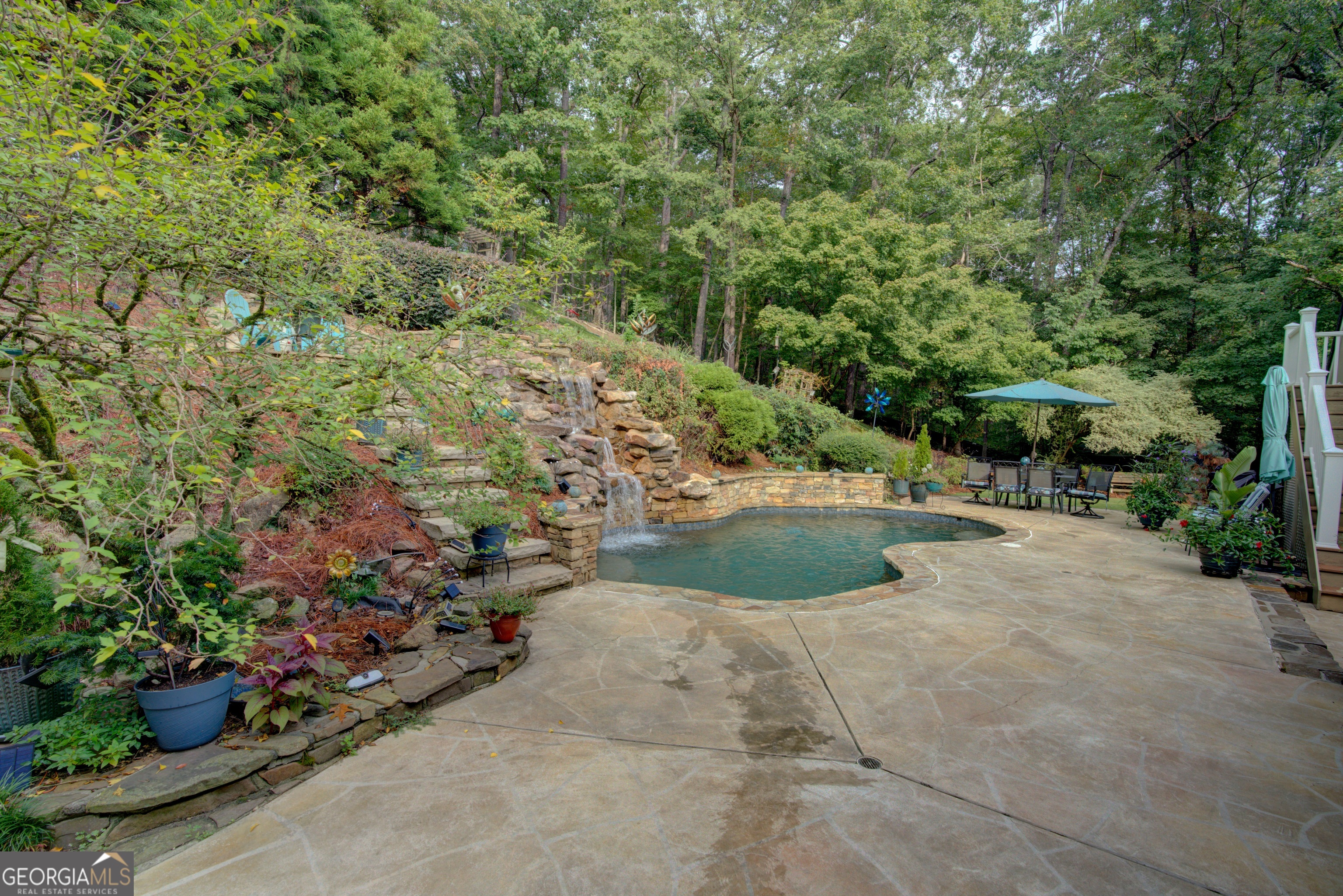 4 Rivermont Drive Southwest Rome, GA 30165 - Photo 52 of 55 a view of a garden with potted plants