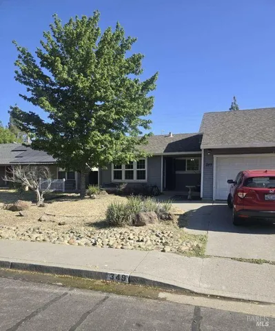 a car parked in front of a house