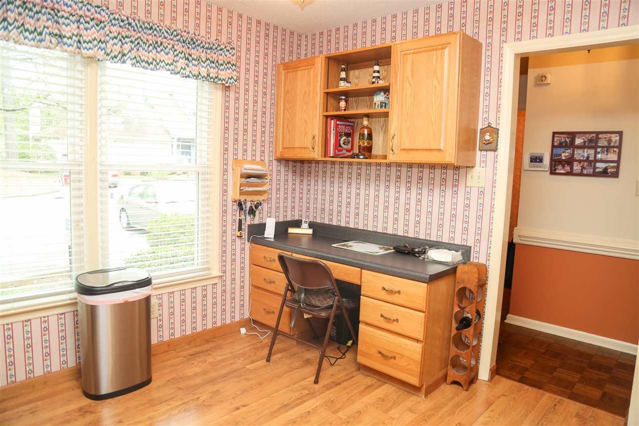 1514 Edgeside Court Raleigh, NC 27609 - Photo 8 of 26 Custom Built in Desk with Cabinets in Kitchen