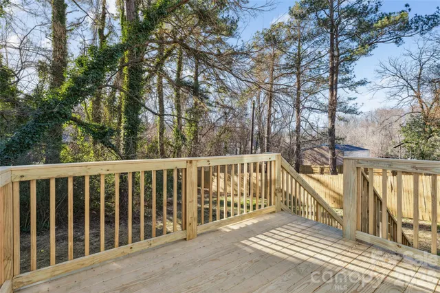a view of a wooden roof deck