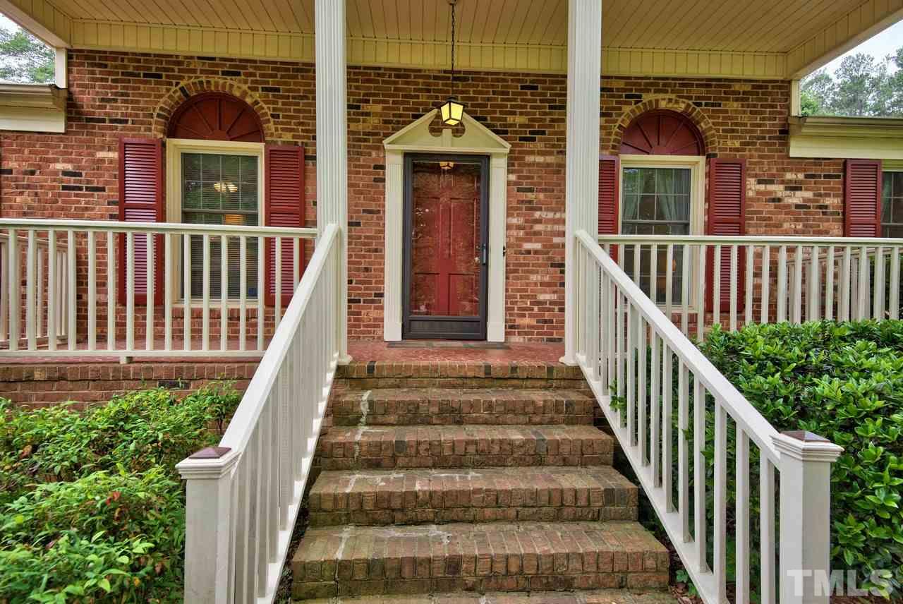 3607 Cole Mill Road Durham, NC 27712 - Photo 2 of 25 The Covered Front Porch is large enough for a furniture and plants.