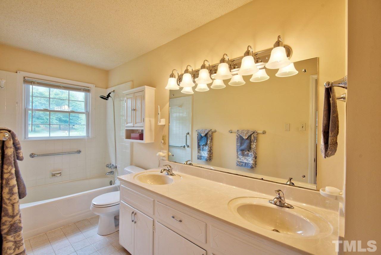 3607 Cole Mill Road Durham, NC 27712 - Photo 16 of 25 The Master Bath is bright and spacious for the age of the home. Dual Sinks and ample cabinetry!