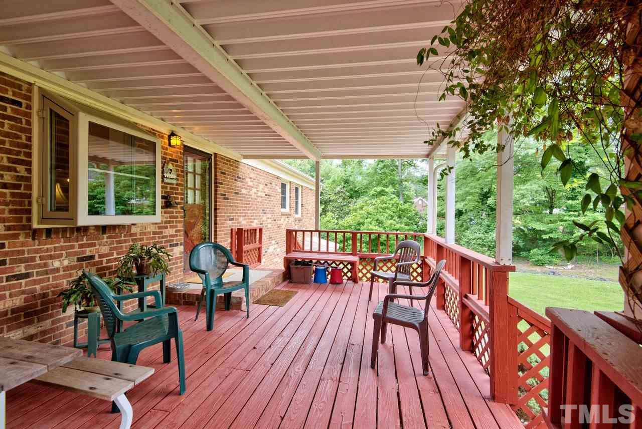 3607 Cole Mill Road Durham, NC 27712 - Photo 21 of 25 Lovely covered deck that you can enjoy year around.