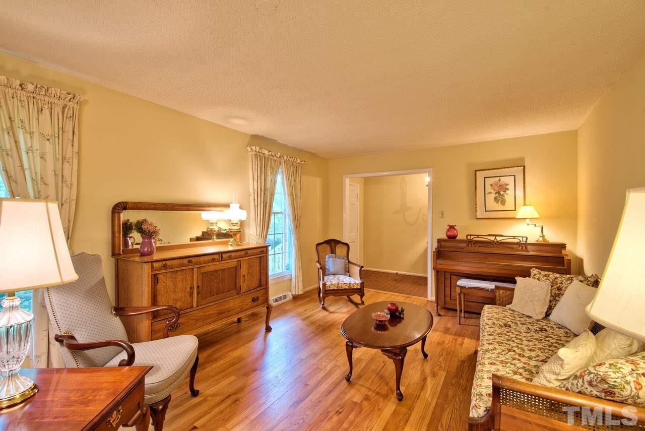 3607 Cole Mill Road Durham, NC 27712 - Photo 5 of 25 The spacious Living Room is currently used as a formal area. How would you use the space?