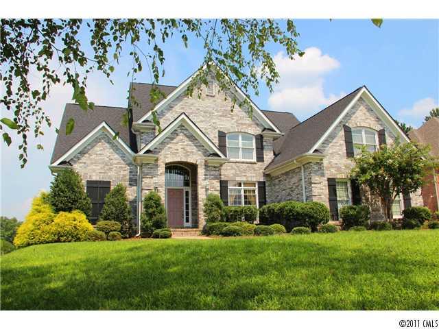 1838 Verdict Ridge Drive Denver, NC 28037 - Photo 1 of 16 a front view of a house with a yard