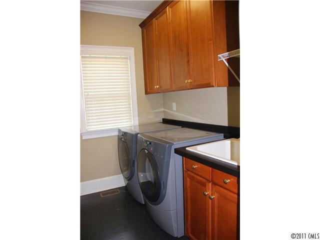 1838 Verdict Ridge Drive Denver, NC 28037 - Photo 11 of 16 a utility room with dryer and washer