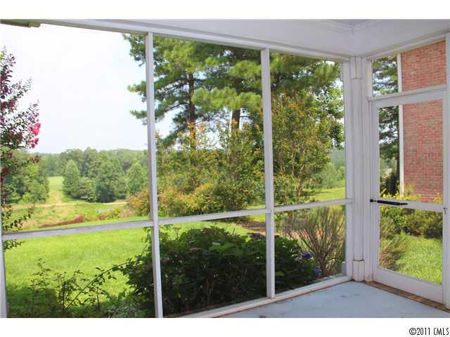 1838 Verdict Ridge Drive Denver, NC 28037 - Photo 13 of 16 a view of a room with a large window and plants