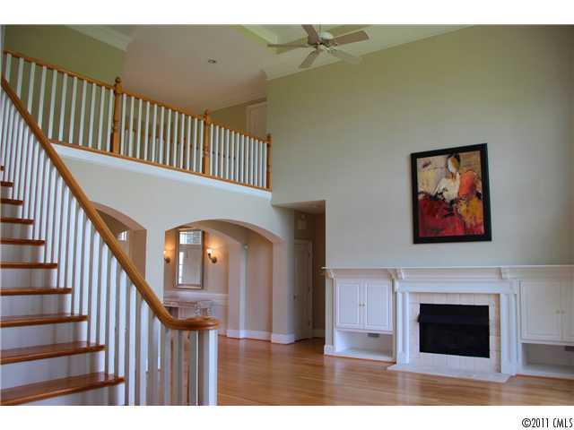 1838 Verdict Ridge Drive Denver, NC 28037 - Photo 4 of 16 a view of entryway and hall with wooden floor