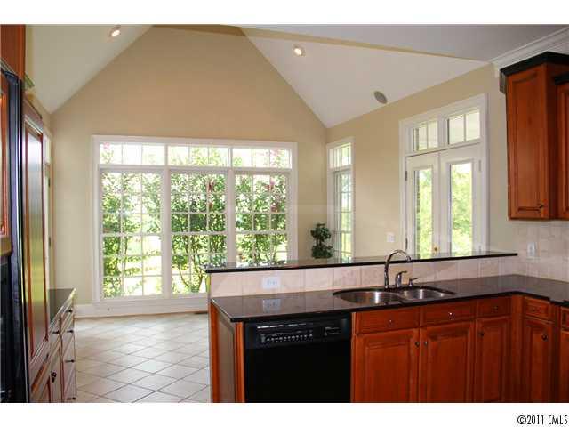 1838 Verdict Ridge Drive Denver, NC 28037 - Photo 7 of 16 a kitchen with a sink and large window