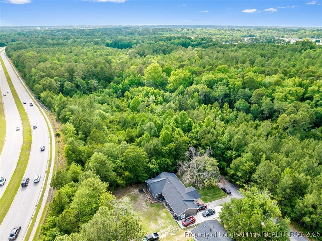 3165 George Owen Road Fayetteville, NC 28306 - Photo 10 of 17 a view of a garden with an outdoor space