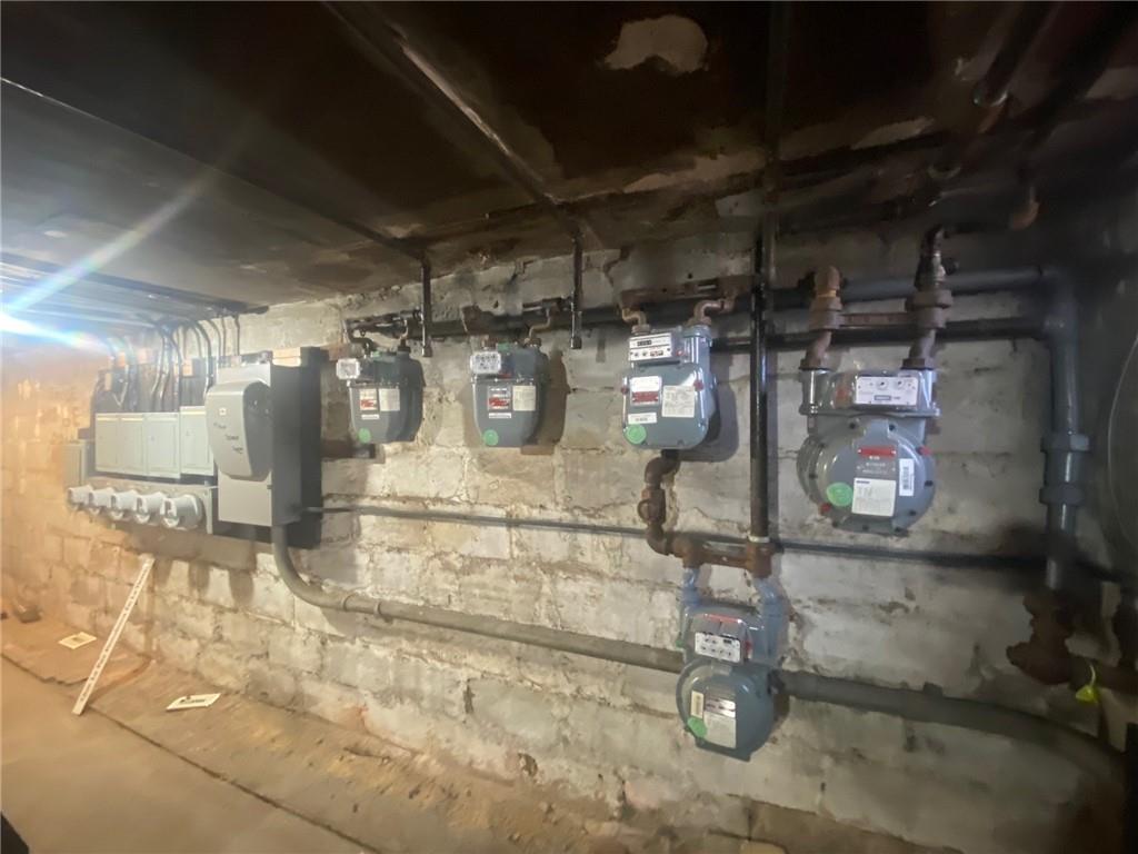 1175 66th Street Brooklyn, NY 11219 - Photo 14 of 17 a view of a room with racks on the wall