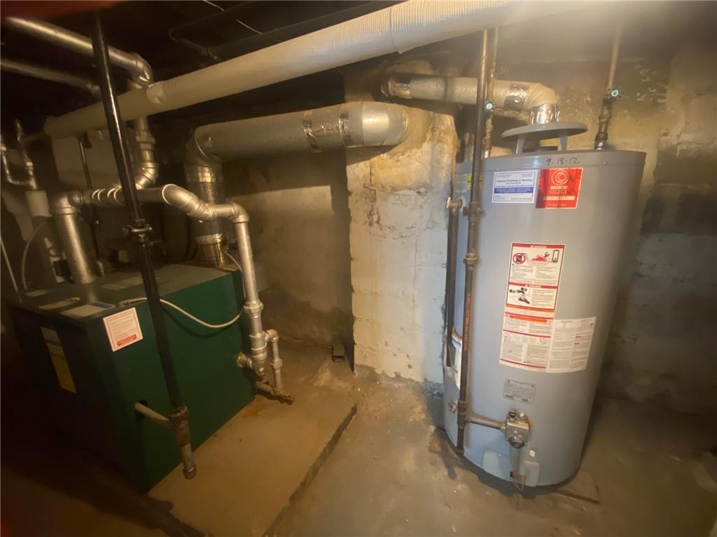 1175 66th Street Brooklyn, NY 11219 - Photo 16 of 17 a view of water heater room