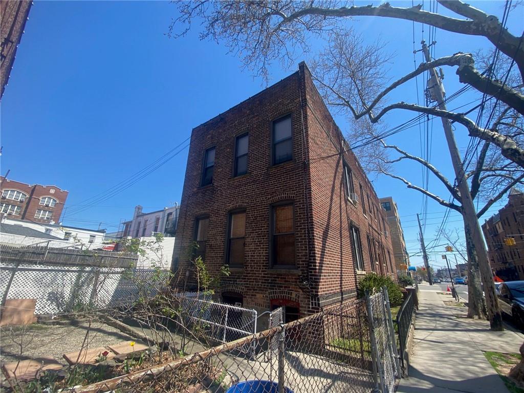 1175 66th Street Brooklyn, NY 11219 - Photo 17 of 17 a view of a house with backyard and sitting area