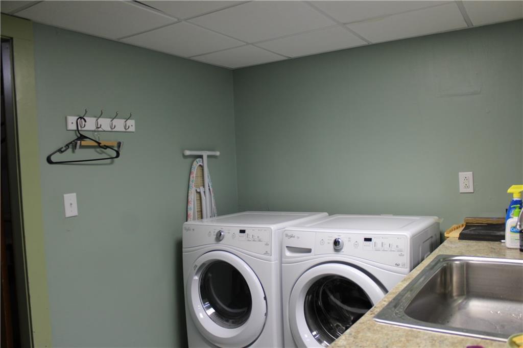 412 Main Road South Hampden, ME 04444 - Photo 29 of 52 laundry and 2nd bathroom in basement