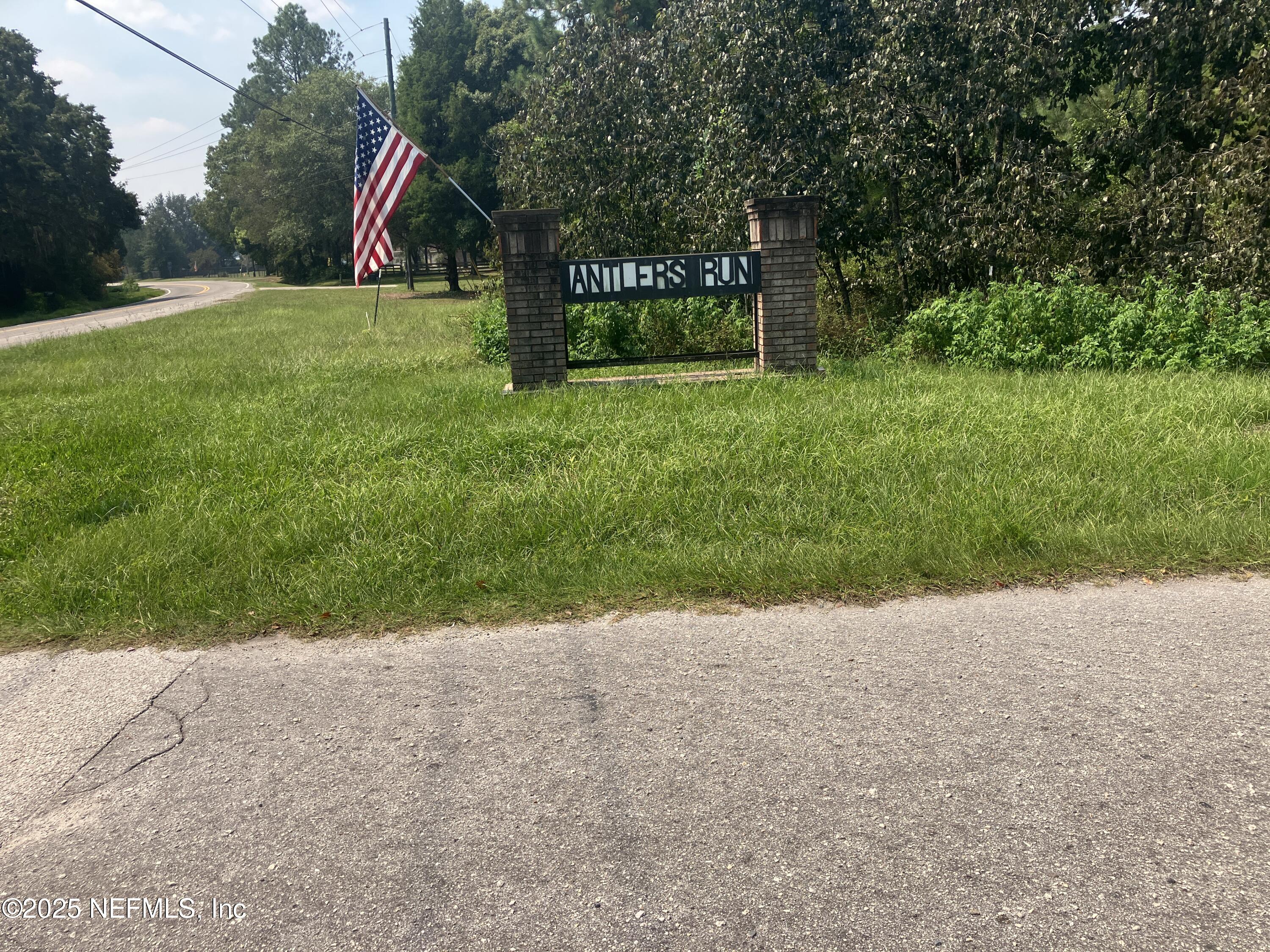 0 County Road 217 Jacksonville, FL 32234 - Photo 3 of 3 a view of a park with a bench and trees