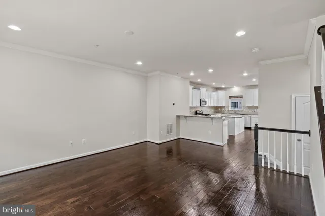 a view of kitchen with wooden floor
