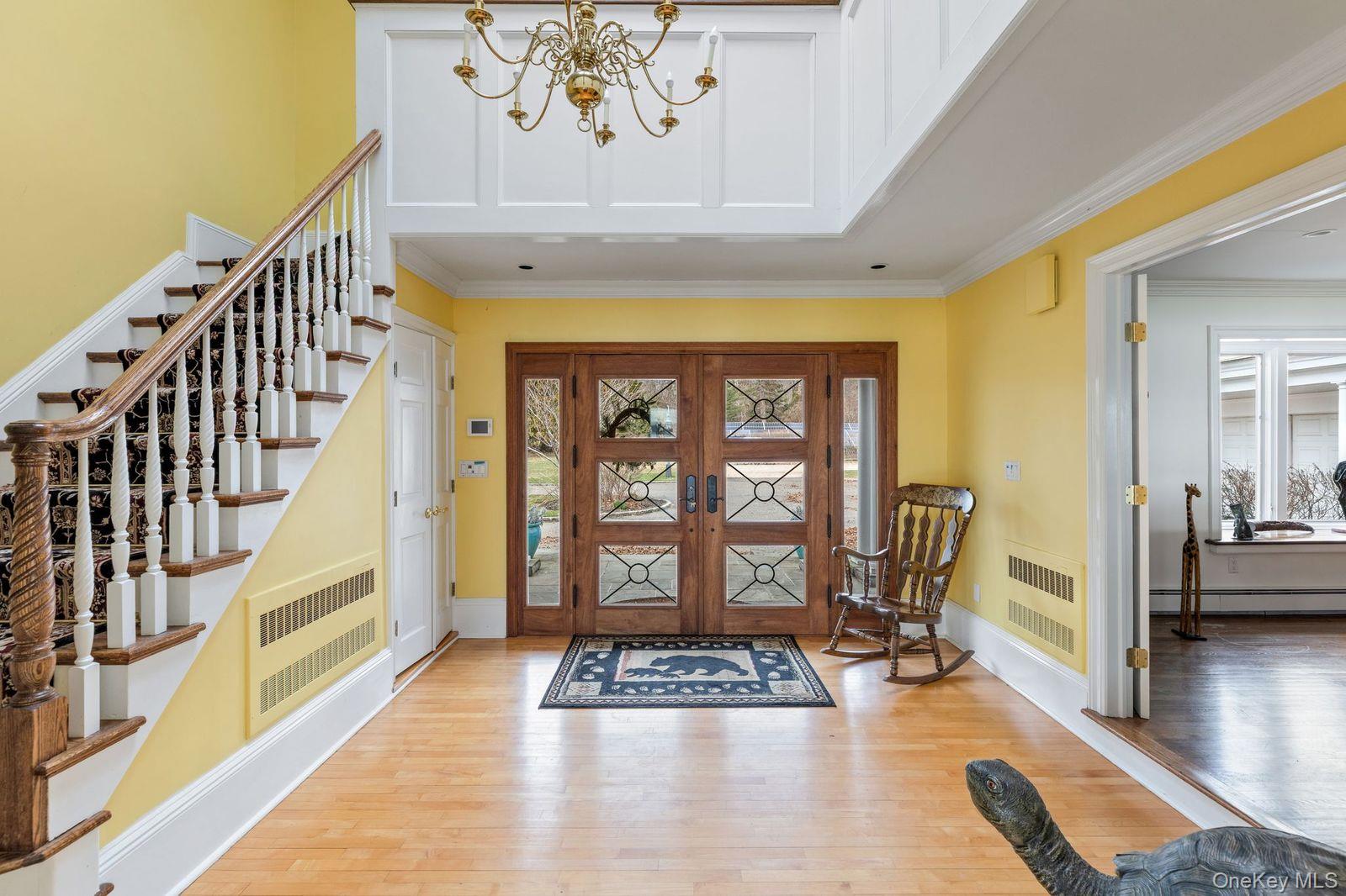 33 Beach Road Northport, NY 11768 - Photo 5 of 50 a view of an entryway with wooden floor
