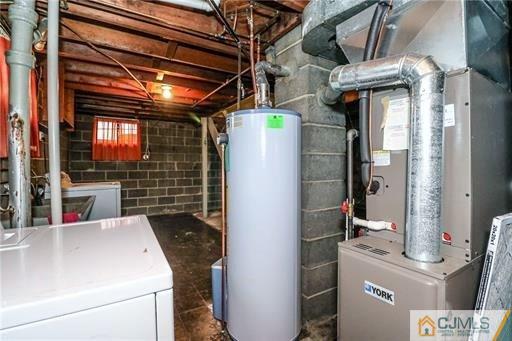 4 North Pennington Road New Brunswick, NJ 08901 - Photo 12 of 14 a utility room with dryer and washer