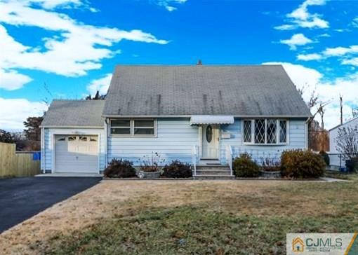 4 North Pennington Road New Brunswick, NJ 08901 - Photo 13 of 14 a front view of a house with a yard
