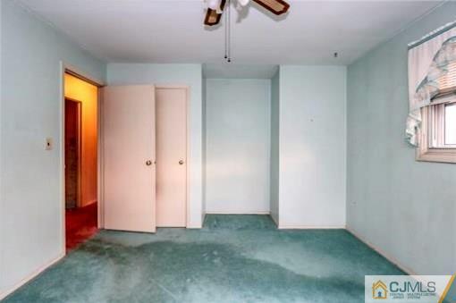 4 North Pennington Road New Brunswick, NJ 08901 - Photo 8 of 14 a view of empty room with windows and ceiling fan