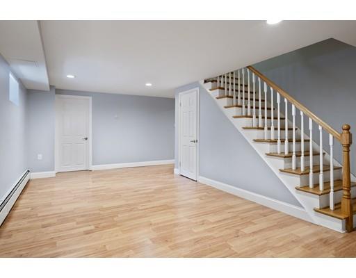 66 Broken Tree Road Newton, MA 02459 - Photo 17 of 26 a view of an empty room with wooden floor
