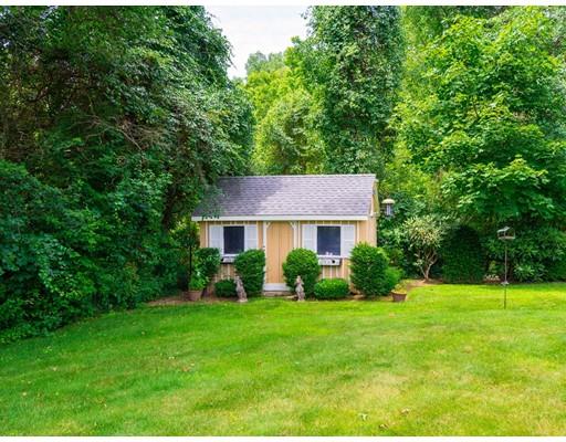66 Broken Tree Road Newton, MA 02459 - Photo 26 of 26 a front view of a house with garden