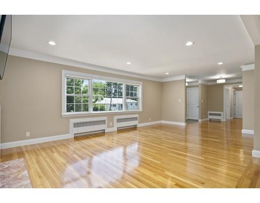 66 Broken Tree Road Newton, MA 02459 - Photo 5 of 26 a view of an empty room with wooden floor and a window