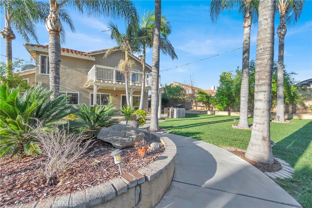 3350 May Court Riverside, CA 92503 - Photo 45 of 55 front view of house with a yard and potted plants