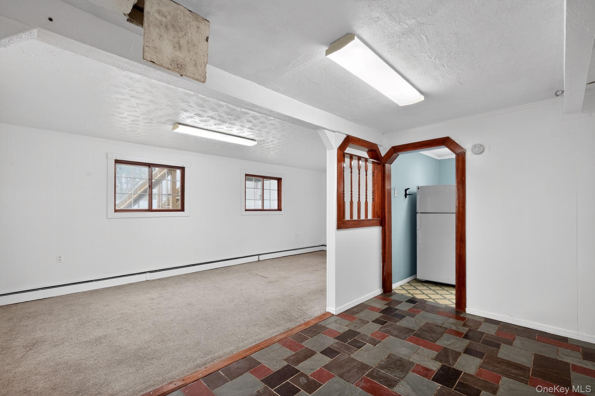 138 Spring Street Massapequa, NY 11758 - Photo 39 of 45 a view of a hallway with entryway