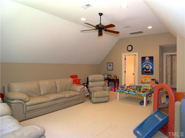 96 Avalant Pittsboro, NC 27312 - Photo 19 of 25 a living room with furniture and a flat screen tv