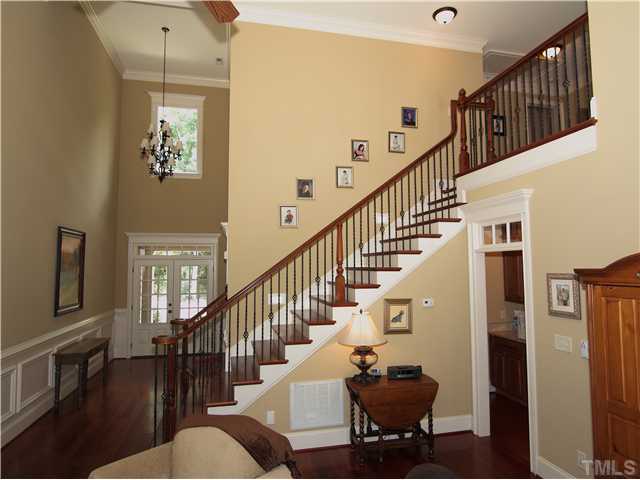 96 Avalant Pittsboro, NC 27312 - Photo 2 of 25 a view of entryway and hall with wooden floor