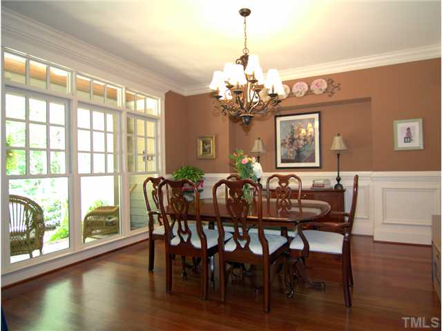96 Avalant Pittsboro, NC 27312 - Photo 3 of 25 a view of a dining room with furniture window and wooden floor