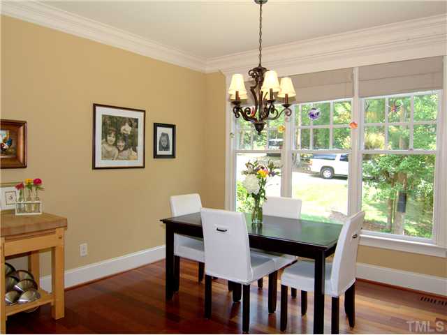 96 Avalant Pittsboro, NC 27312 - Photo 9 of 25 a view of a dining room with furniture window and wooden floor