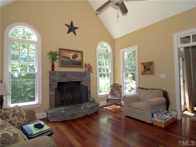 96 Avalant Pittsboro, NC 27312 - Photo 10 of 25 a living room with furniture and a fireplace