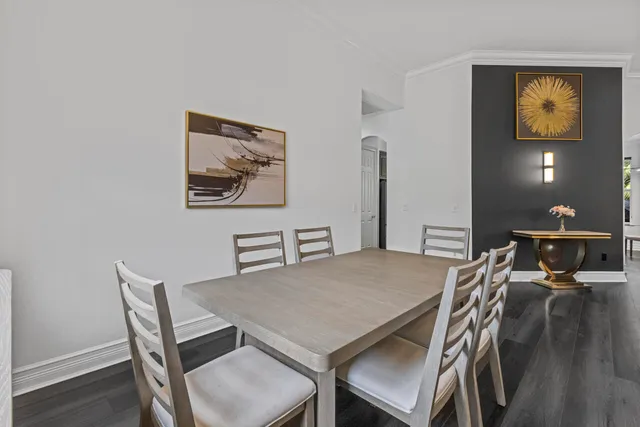 a bedroom with furniture and flat screen tv