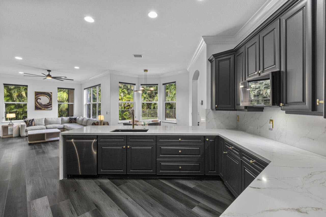 8300 Southwest Cattleya Drive Stuart, FL 34997 - Photo 24 of 77 a kitchen with lots of counter top space